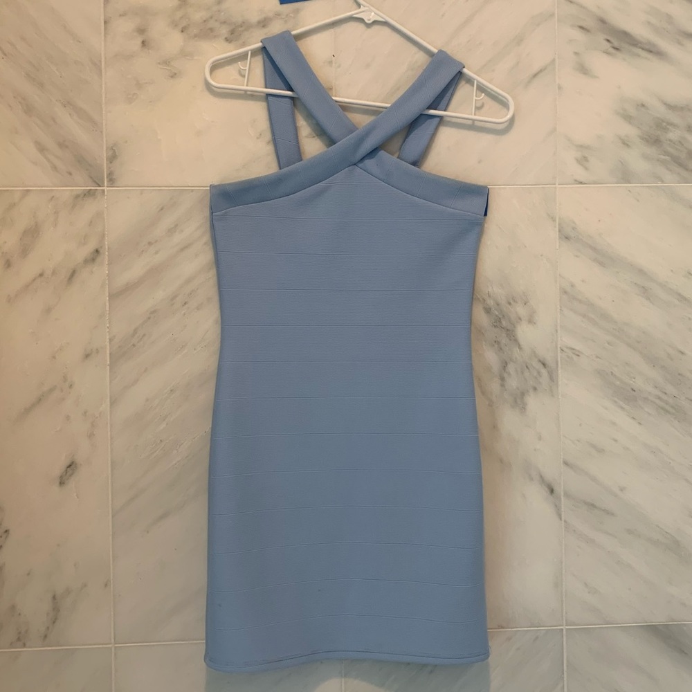 Light blue, polyester dress, in good conditions.